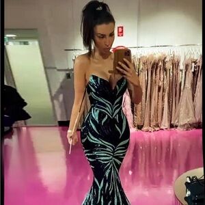 Portia and Scarlett PS 22538. Color black/mint sequin pattern gown.